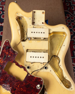 Body under pickguard showing clear nail holes