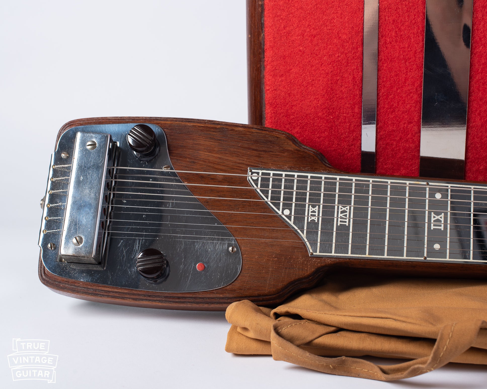 Red button on Fender lap steel guitar organ button