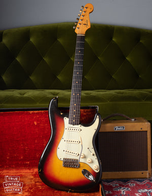1963 Fender Stratocaster with Sunburst finish, mint green pickguard