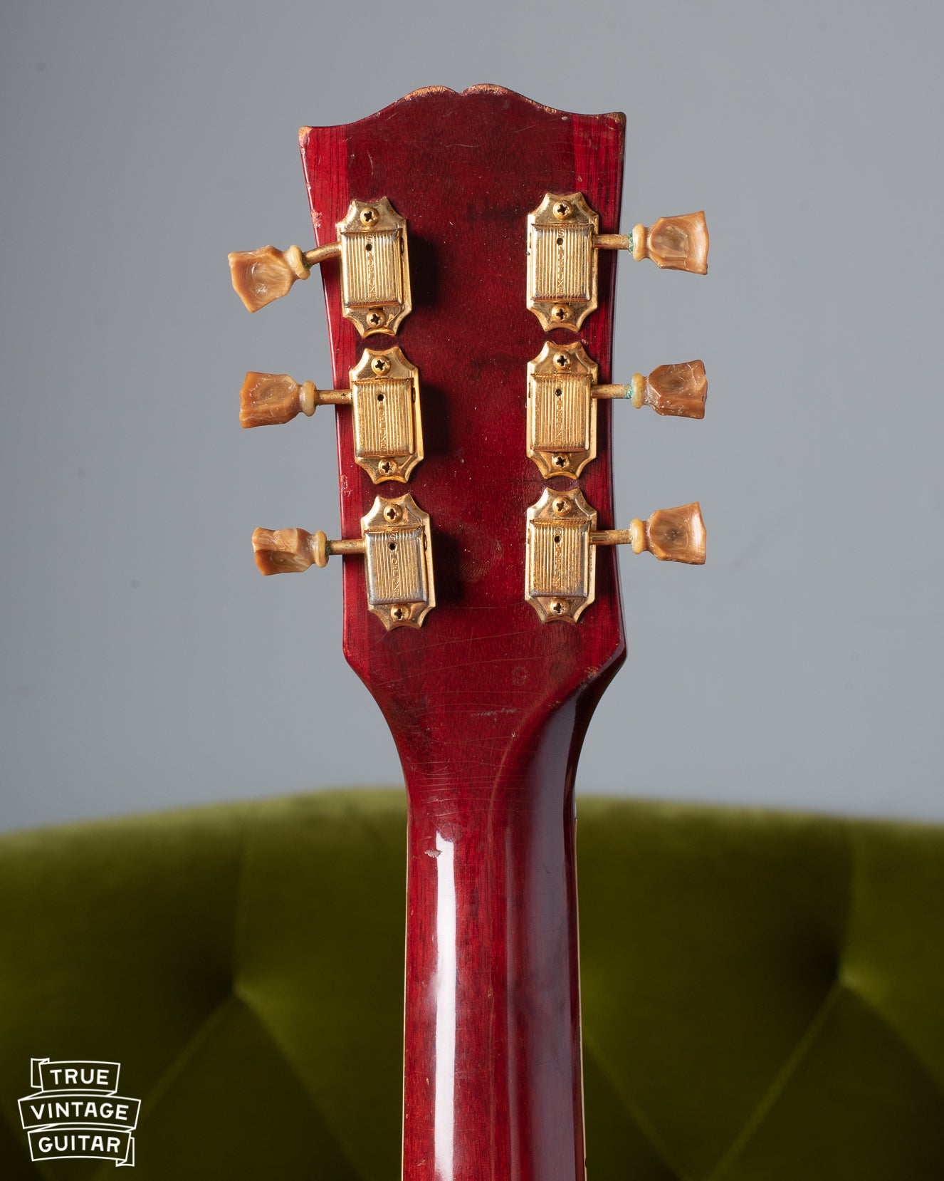 Gold Kluson tuners with original shrunken buttons 