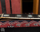 Refret inside the binding preserving the nibs on 1969 Gibson Les Paul Custom.