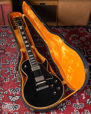 1969 Gibson Les Paul Custom black with gold hardware in yellow and black case.