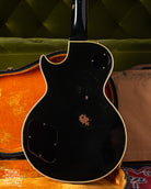 Back of body of 1969 Gibson Les Paul Custom black guitar with gold parts..